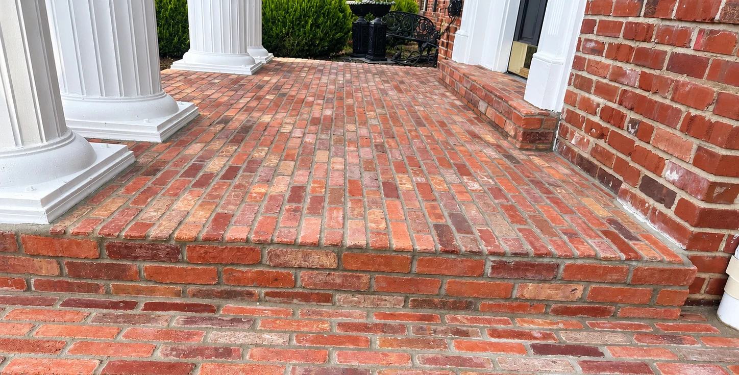 Finished brick porch and entry steps viewed from the front