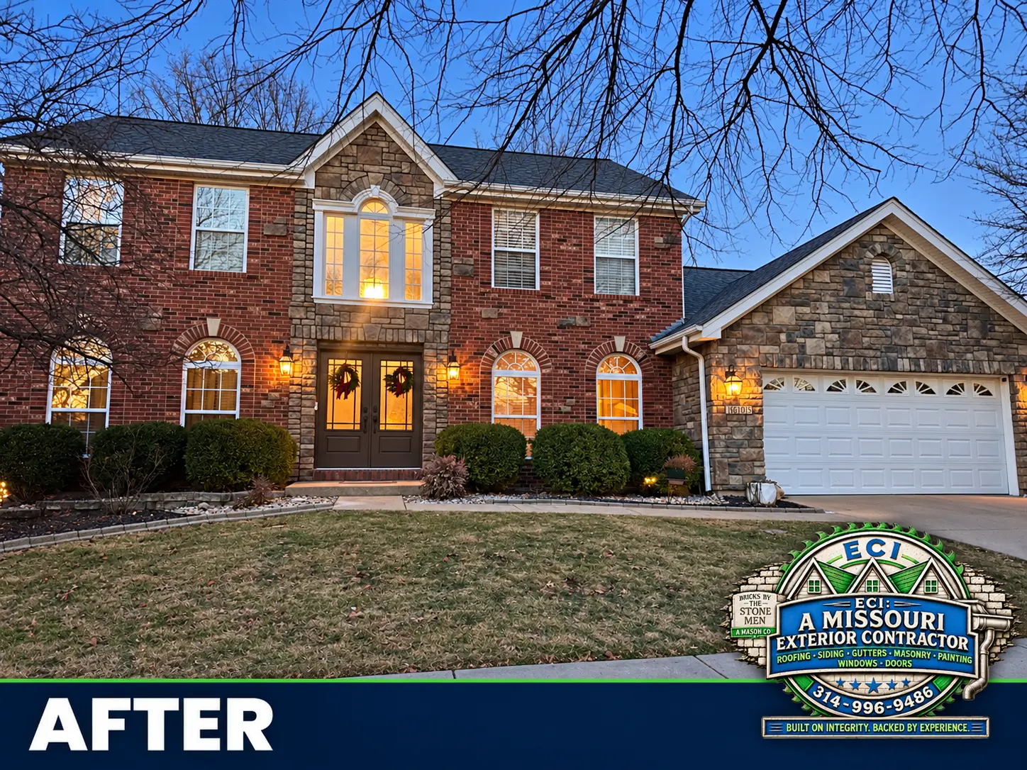 Completed brick-and-stone home and garage photographed at dusk