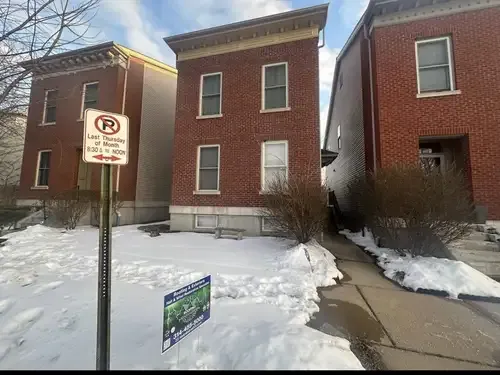 Historic red brick building photographed at an ECI project site