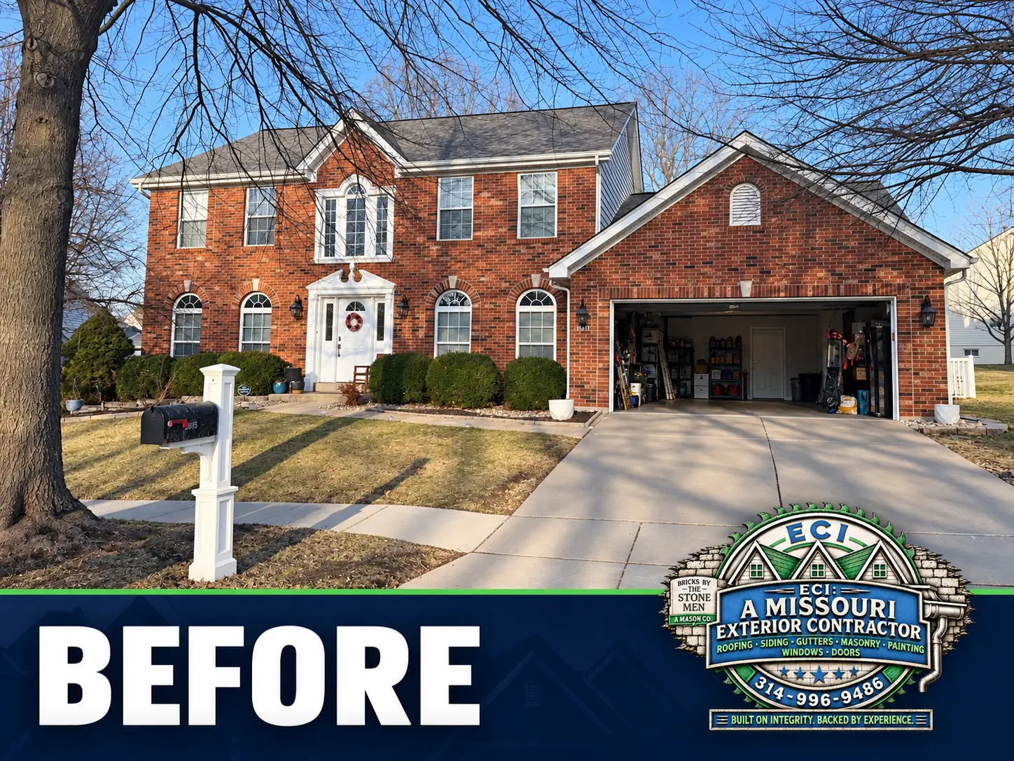 Front of the brick home and garage before stonework