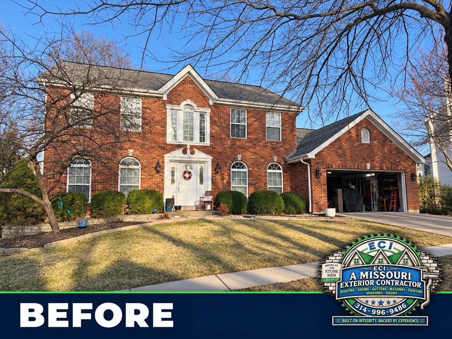 Brick house and garage before exterior stonework